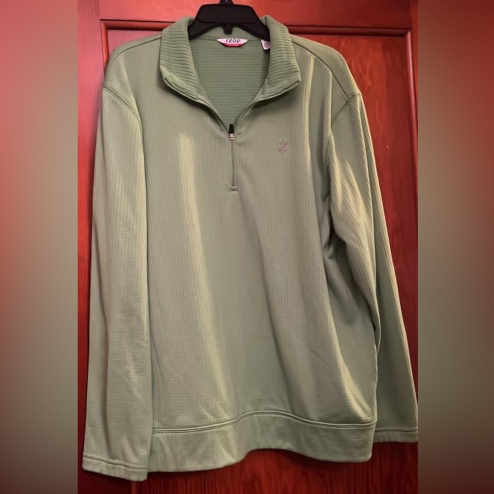 Green men’s Izod pullover.